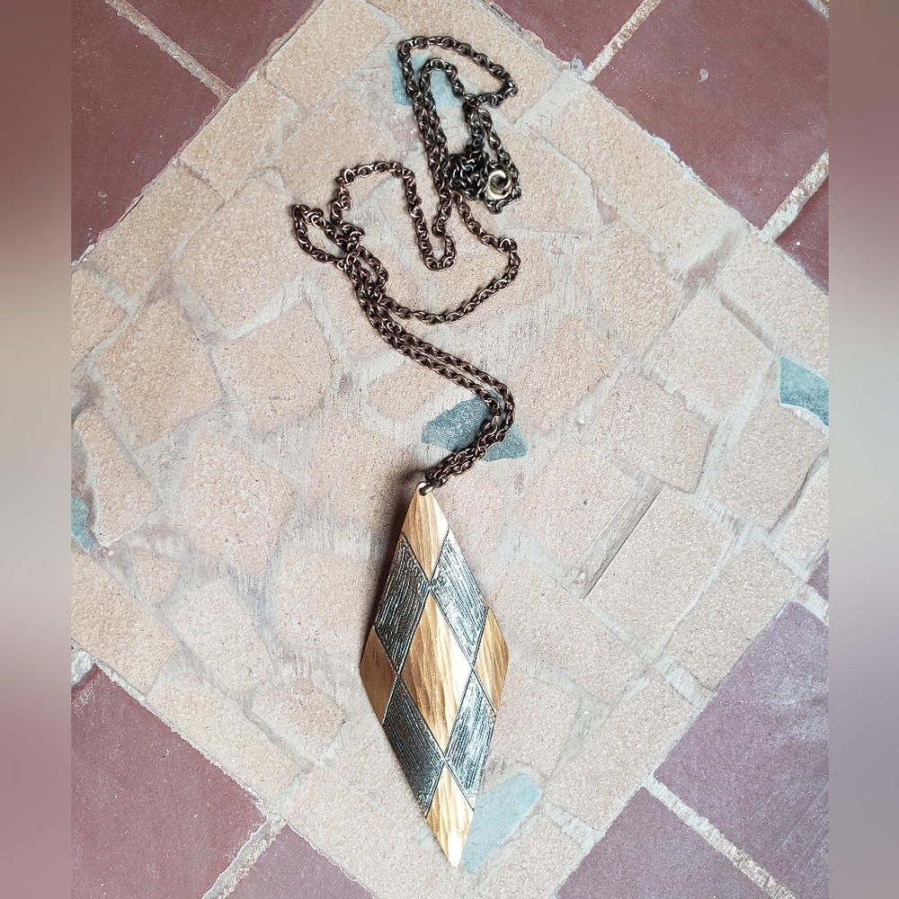 Gorgeous copper Moda International handmade long necklace.